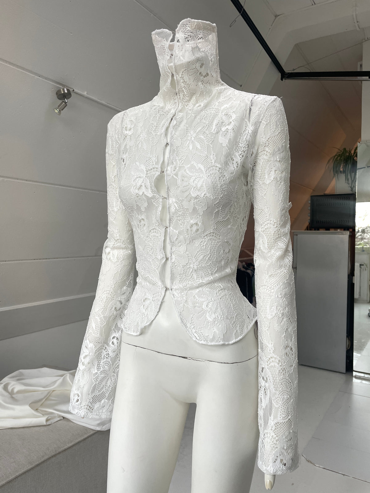 CORSETED TURTLENECK